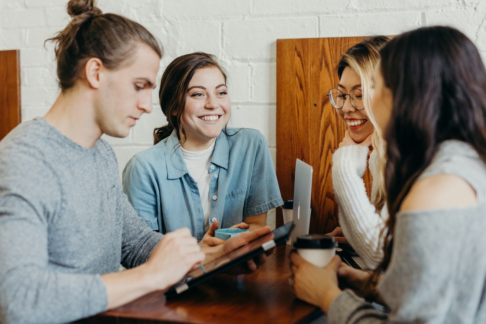 Young people collaborating at a shared table